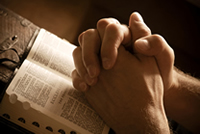 Praying Hands with Bible
